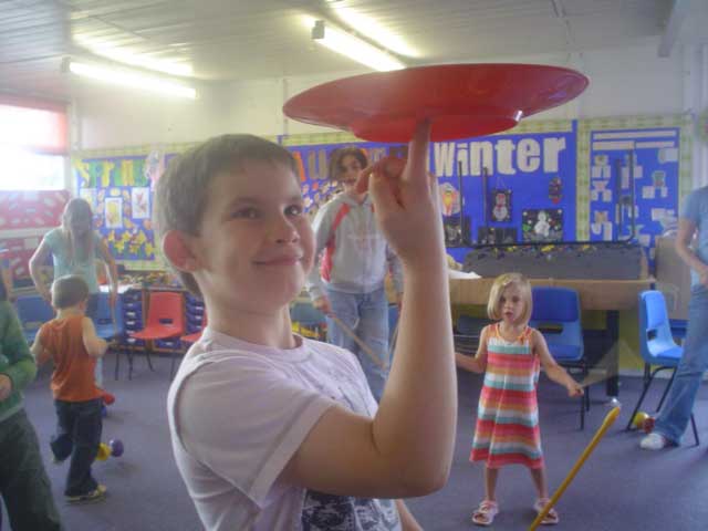 child enjoying circus skill workshop